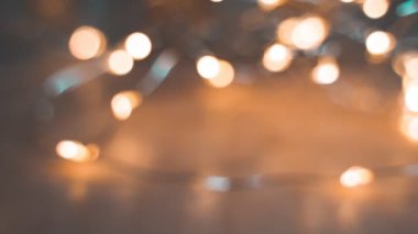 Teal and orange beautiful blurred bokeh lights background