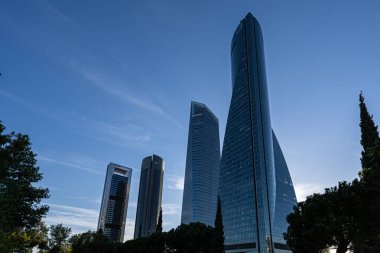 The four modern skyscrapers or Cuatro Torres in Madrid, Spain clipart