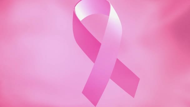 Roze lint zwaaiende vlag. Bestrijding van kanker — Stockvideo