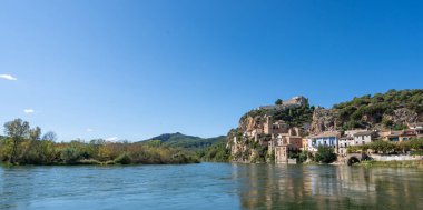 Templar castle of Miravet and the Ebro river. clipart