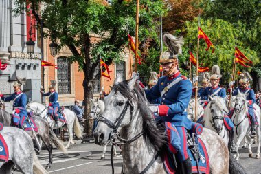 Madrid, Spain. October 12, 2014, Members of the Royal Escort Squadron of the Spanish Royal Guard parading on horseback in Madrid, during Hispanic Heritage Day
