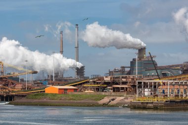 Steel factory in harbor IJmuiden, The Netherlands clipart