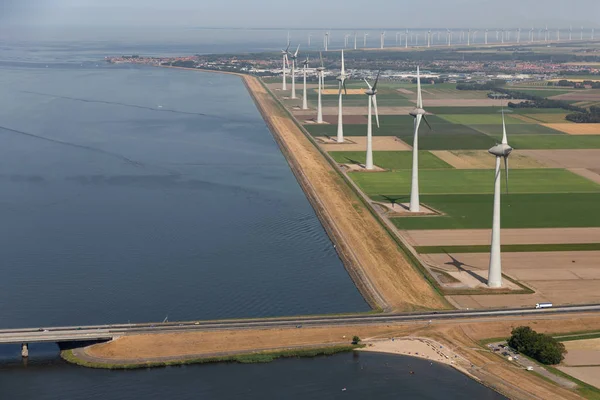 Aerial view Dutch agricultural landscape with wind turbines along coast — Stock Photo, Image