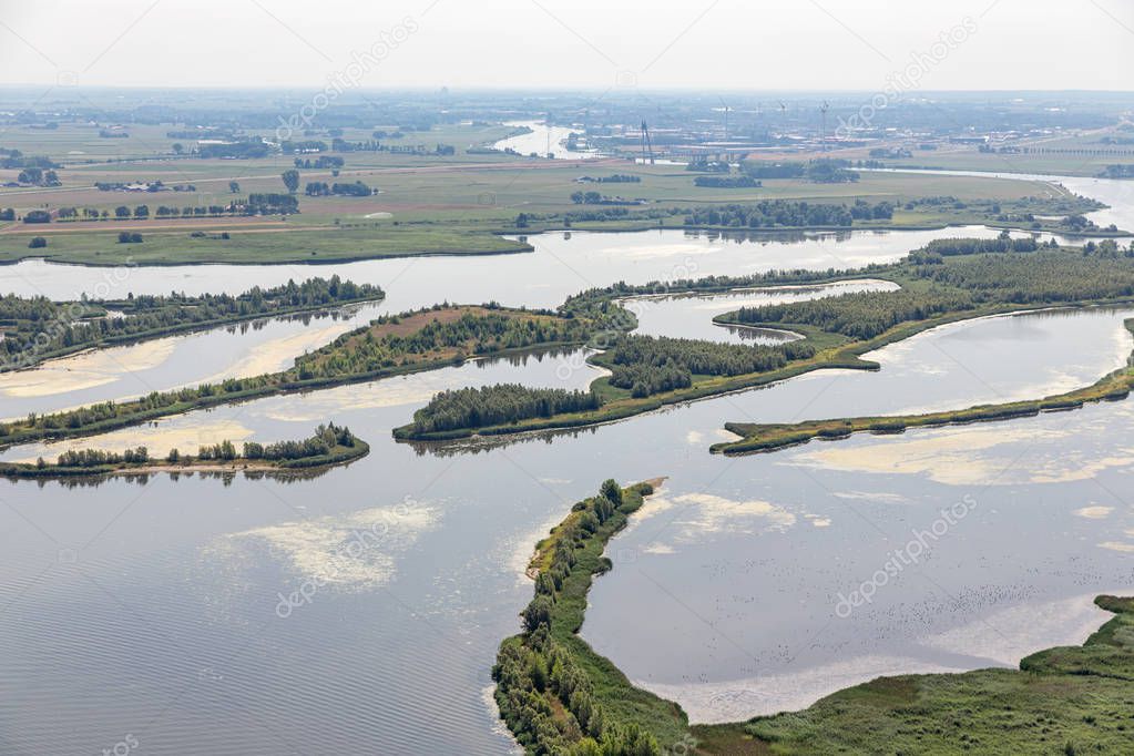 Estuary of Dutch river IJssel with small islands and wetlands