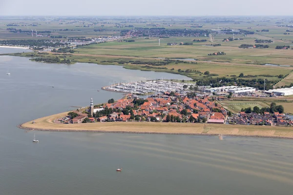 Aerial view Dutch village Hindeloopen at lake IJsselmeer with marina — Stock Photo, Image