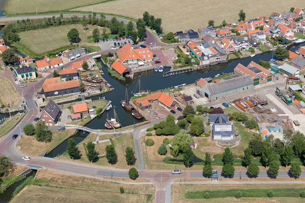 Aerial view inner harbor Dutch village Workum with traditional shipyard — Stock Photo, Image