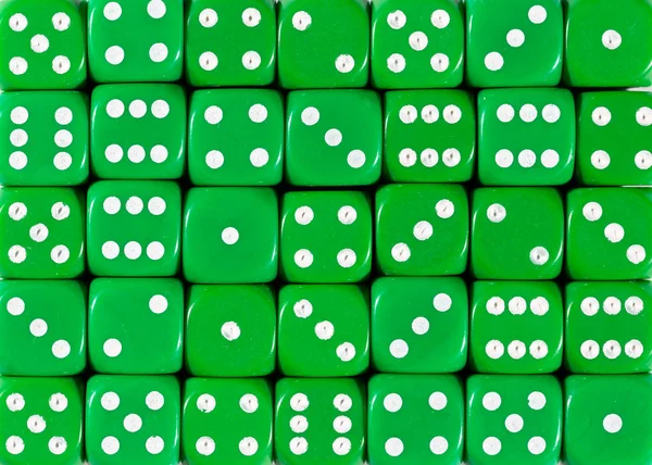 Background pattern of green dices, random ordered