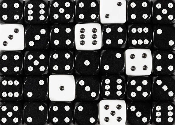 Background of random ordered black dices with six white cubes — Stock Photo, Image