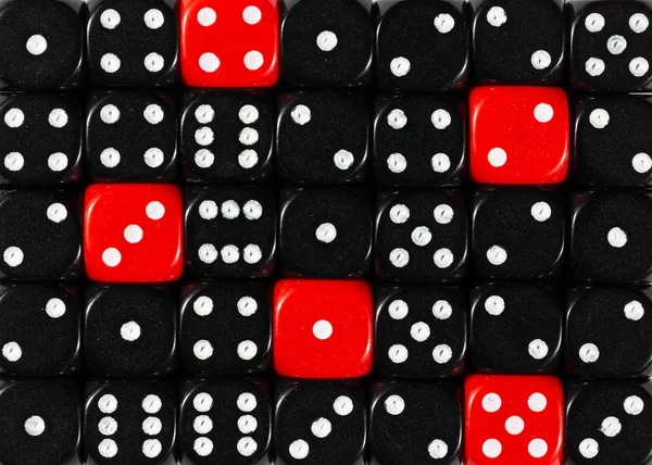 Background of random ordered black dices with five red cubes — Stock Photo, Image