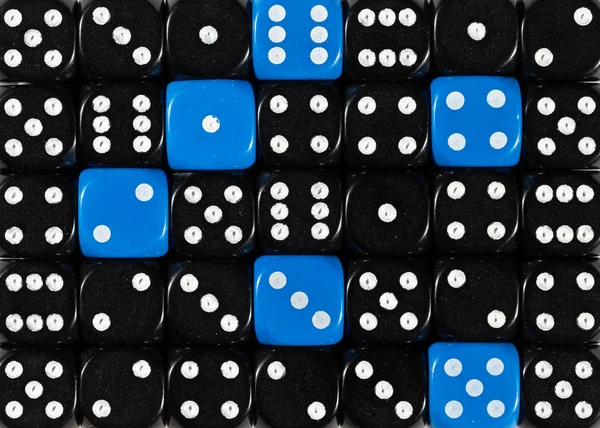 Background of random ordered black dices with six blue cubes — Stock Photo, Image