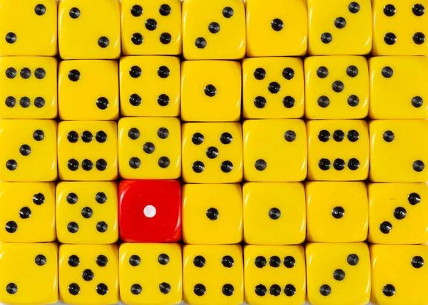 Background of random ordered yellow dices with one red cube — Stock Photo, Image