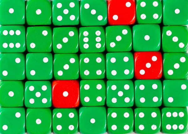 Background of random ordered green dices with three red cubes — Stock Photo, Image