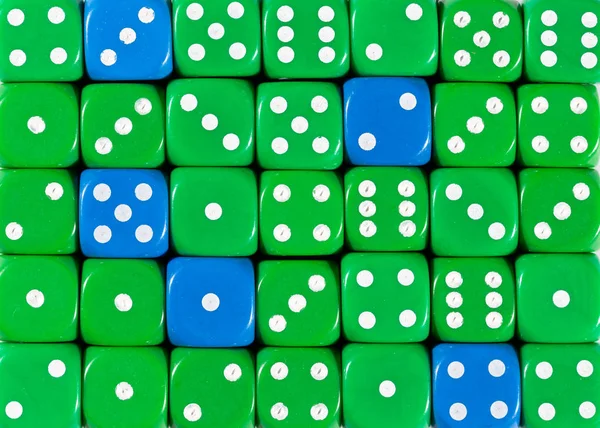 Background of random ordered green dices with five blue cubes — Stock Photo, Image