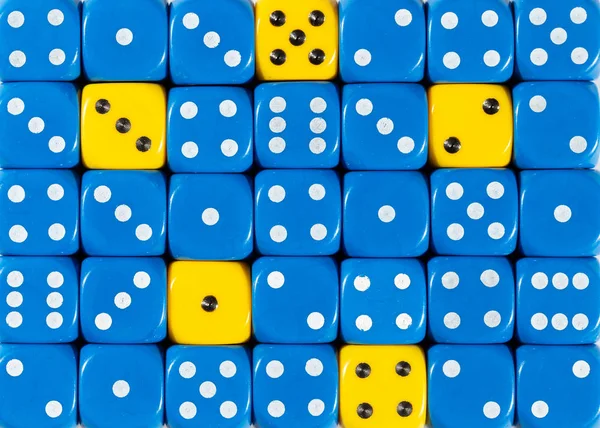 Background of random ordered blue dices with five yellow cubes — Stock Photo, Image