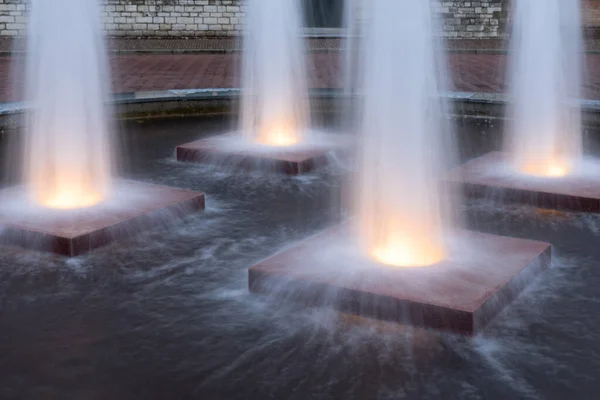 Four illuminated fountains in medieval city Middelburg, The Netherlands — Stock Photo, Image