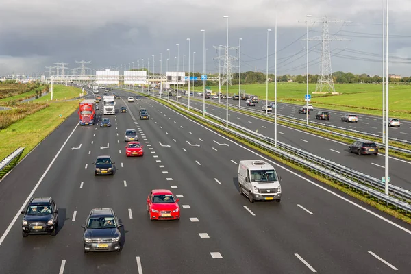 Dutch motorway A1 near Amsterdam with fourteen driving lanes — Stock Photo, Image