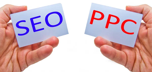 SEO versus PPC - Search Engine Optimization vs Pay Per Click — Stock Photo, Image