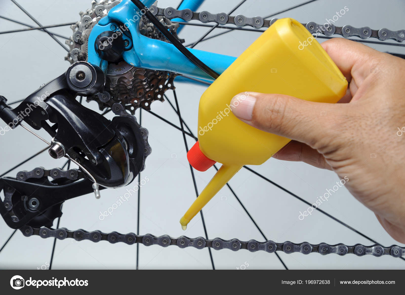 oiling bicycle