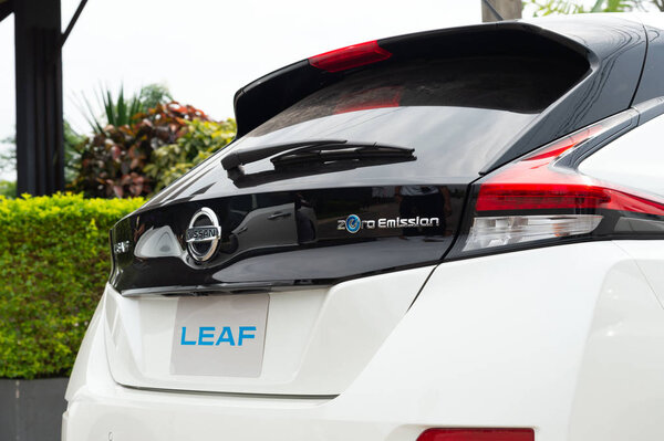 CHIANG RAI, THAILAND-OCTOBER 10, 2018, closeup All New Nissan Leaf EV Car Zero Emission with soft-focus and over light in the background