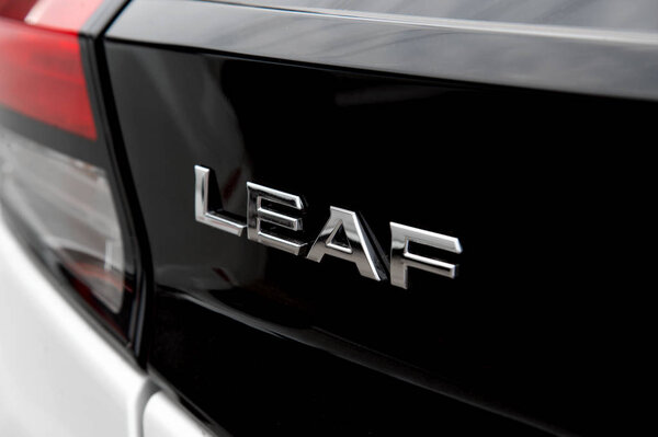 CHIANG RAI, THAILAND-OCTOBER 10, 2018, closeup All New Nissan Leaf EV Car Zero Emission with soft-focus and over light in the background