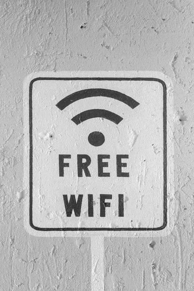 Free Wifi Sign White Brick Wall Background — Stock Photo, Image