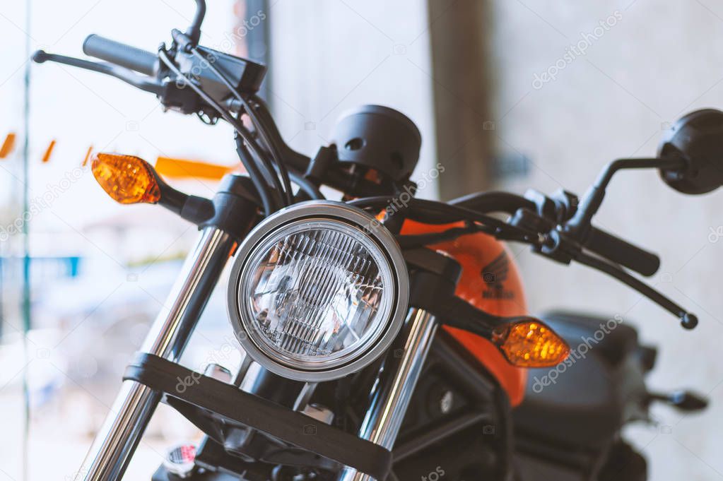 CHIANG RAI, THAILAND-MARCH 20, 2019 closeup Honda Rebel 500 with soft-focus and over light in the background