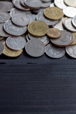 Thai money on black wood table. top view