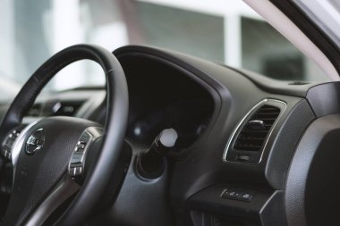 CHIANG RAI, THAILAND-APRIL 9, 2018, closeup interior in the nissan car with soft-focus and over light in the background
