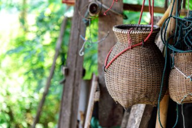 wicker basket for fish. made of bamboo with soft-focus and over light in the background