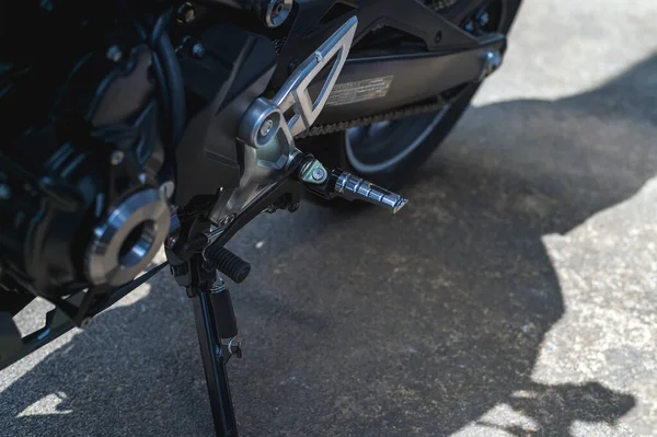 Closeup Sport Motorcycle Foot Rest Gear Control Soft Focus Light — Stockfoto