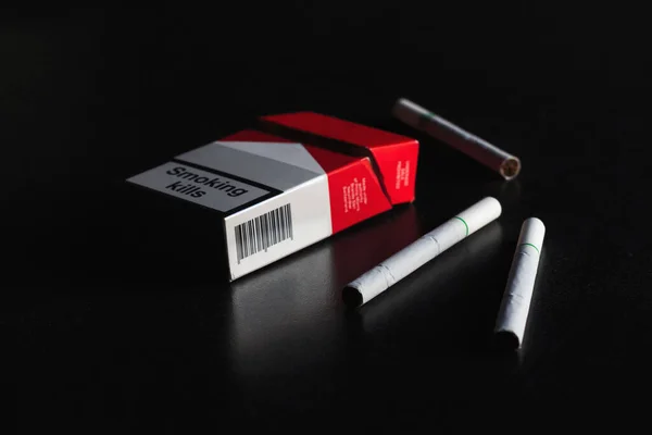 Smoking Concept Cigarette Black Wood Table Soft Focus Light Background — Stock Photo, Image