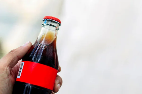 Hand Holding Glass Bottle Soft Focus Light Background — Stock Photo, Image