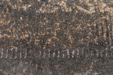 Çatlak asfalt arka plan ve doku. Yol yapım ve onarım teması. en üstteki görünüm