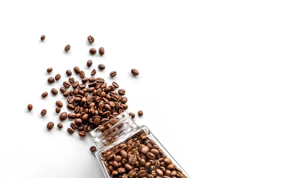 Granos Café Una Botella Vidrio Sobre Fondo Mesa Blanco Vista —  Fotos de Stock