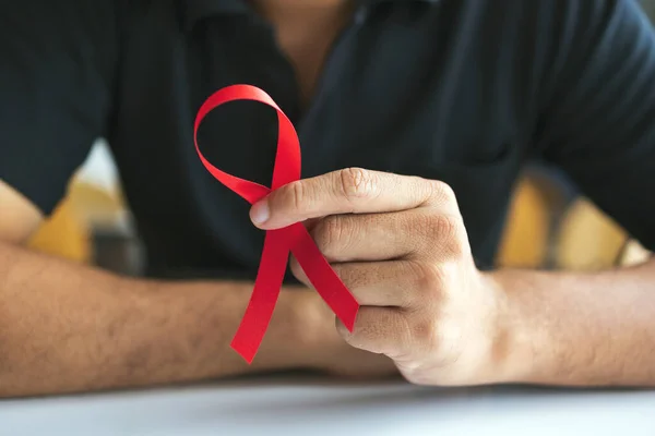 Young Man Red Ribbon Fight Aids Soft Focus Light Background — Stock Photo, Image