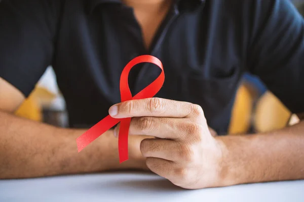 Young Man Red Ribbon Fight Aids Soft Focus Light Background — Stock Photo, Image