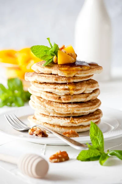 Bunch Pancakes Poached Peaches Nuts — Stock Photo, Image