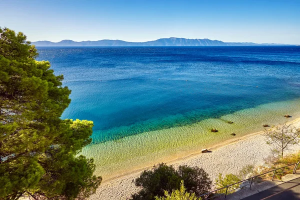 Sunny morning scene of Drvenik Beach. Amazing summer seascape of Adriatic sea, Croatia, Europe. Beautiful world of Mediterranean countries.