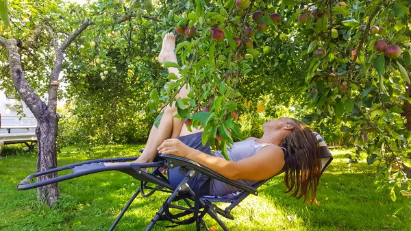 Middle Aged Man Long Hairs Relaxing Deck Chair Garden Tree — Stock Photo, Image