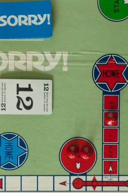 WOODBRIDGE, NEW JERSEY - October 9, 2018: Details of a circa 1980s board game of Sorry are shown clipart