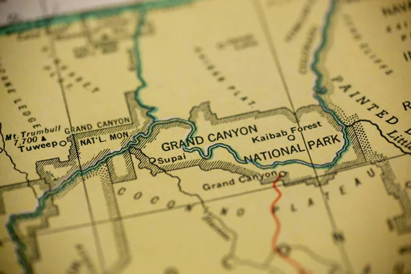 The Grand Canyon is the center of focus, printed on an old map.