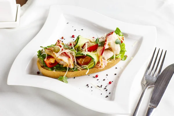 Bruschetta Bacon Fresh Vegetables Capers White Plate — Stock Photo, Image