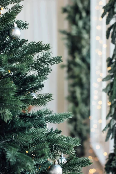 Decorated Christmas tree, minimalist Scandinavian decor background