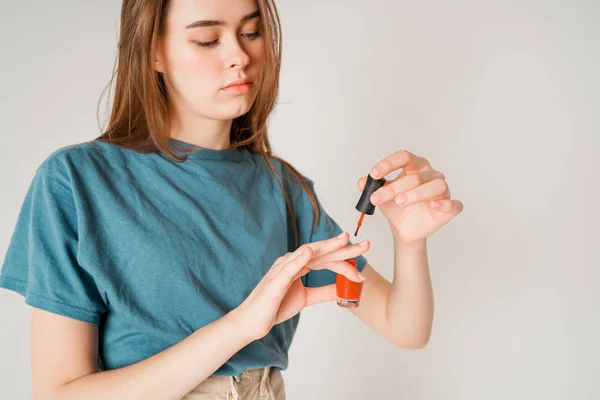 Crop Photo Young Cute Teen Girl Paints Nails Isolated Grey — Stock Photo, Image
