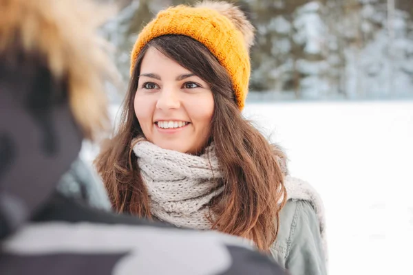 The happy young couple in love at the forest nature park in cold season. Travel adventure love story — Stock Photo, Image