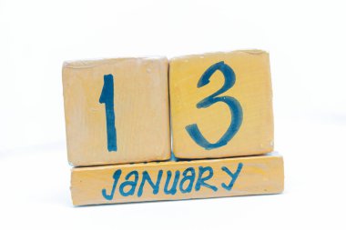 13 Ocak. Gün 13 ay, takvim ahşap arka plan üzerinde. Kış saati, yıl kavramı