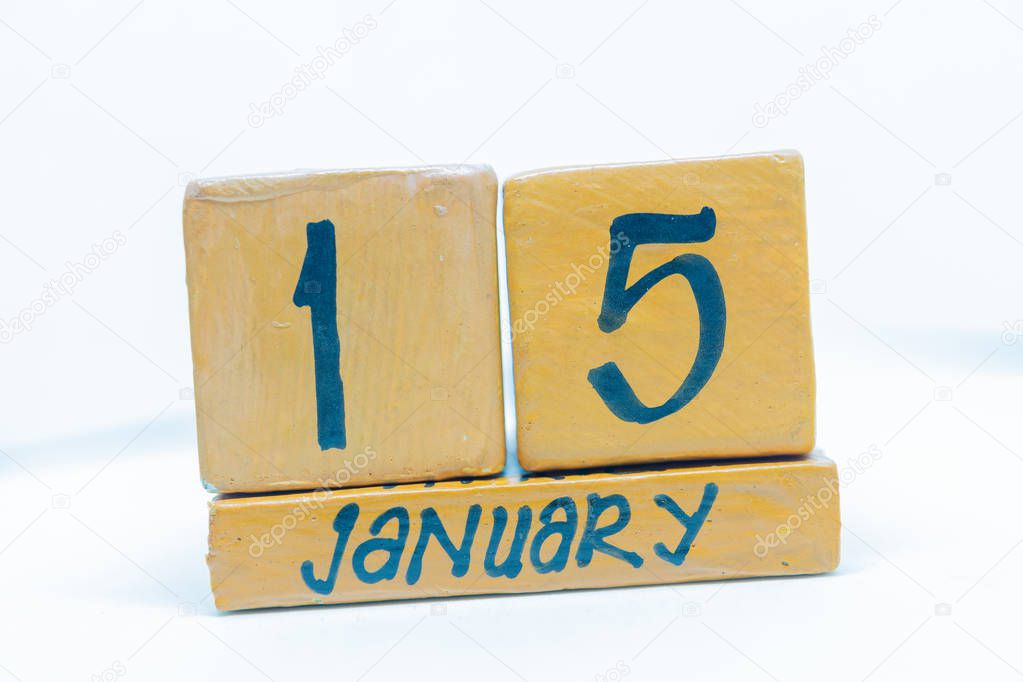 January 15th. Day 15 of month, calendar on wooden background. Winter time, year concept