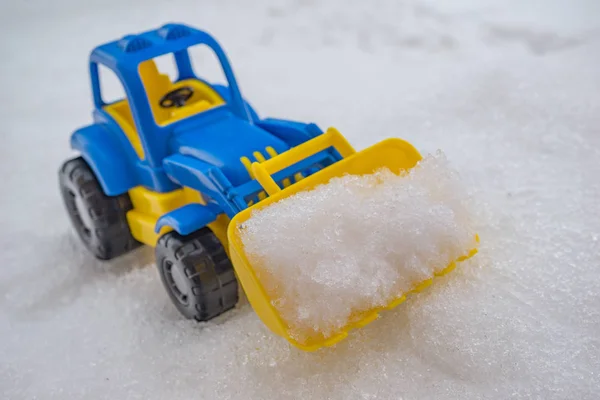 Plastic Blue Yellow Toy Tractor Front Loader Snow Concept Utilities — Stock Photo, Image