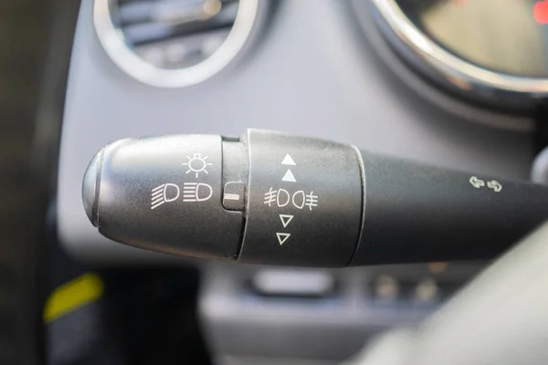 modern car interior with light switch close up