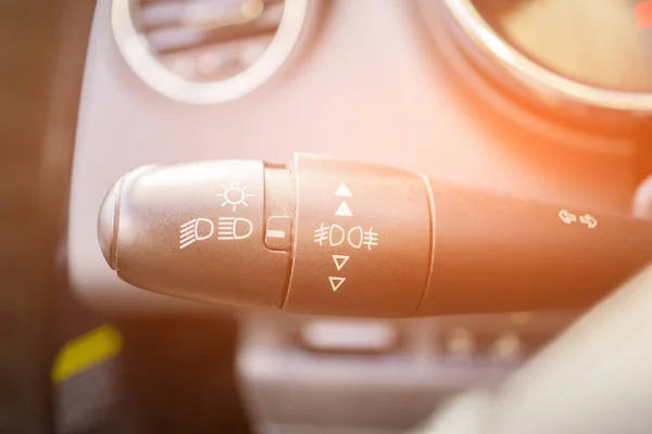 modern car interior with light switch close up